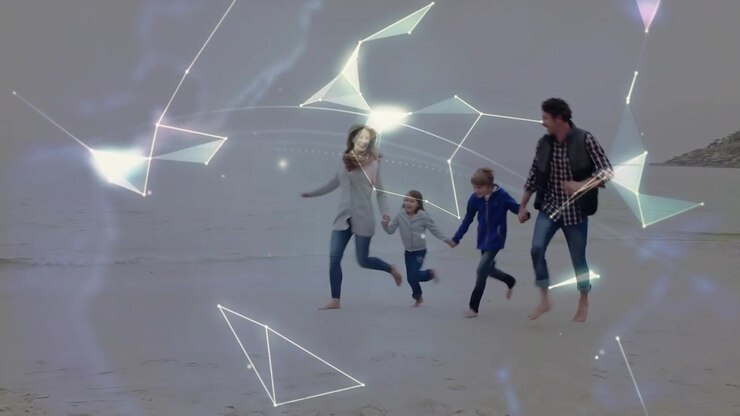 Family arriving on beach holding hands, forming circle and activating holo tech globe for bonding