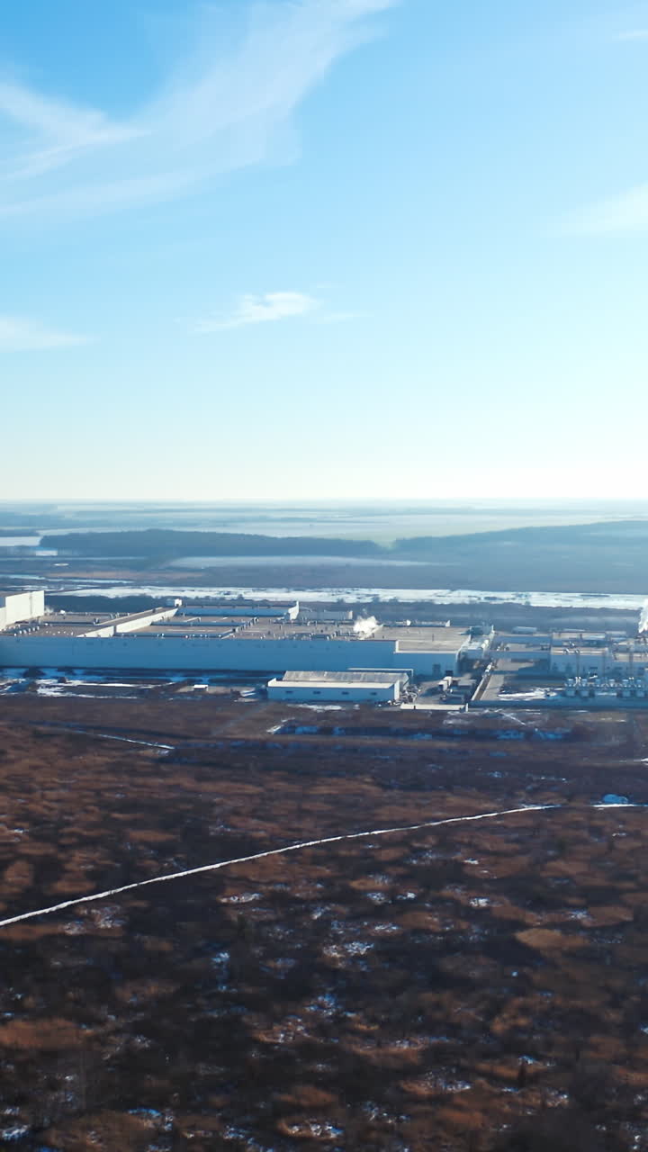 Industrial buildings from above. Aerial view of industrial zone and technology park