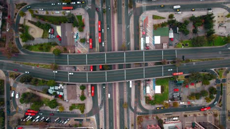 Top-down-drone-shot-over-the-Escuela-Militar-Subway-station-and-Mall-in-Santiago-de-Chile