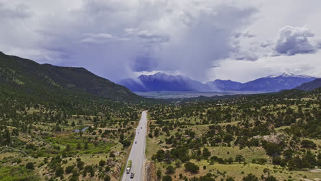 drone flyover view of a mountain in the distance on the million dollar highway