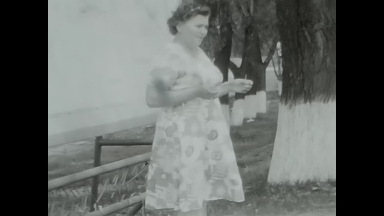 Group of Soviet People in a Black and White Video. CIRCA USSR 1970: This black and white video portrays a group of people from the USSR, showcasing the essence of Soviet society.