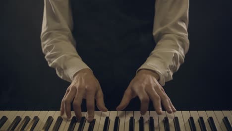 male piano player in a suit playing a smoking piano 4k,