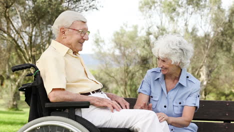 old couple talking sitting