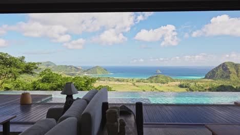 large infinity pool next to entertaining area of private villa