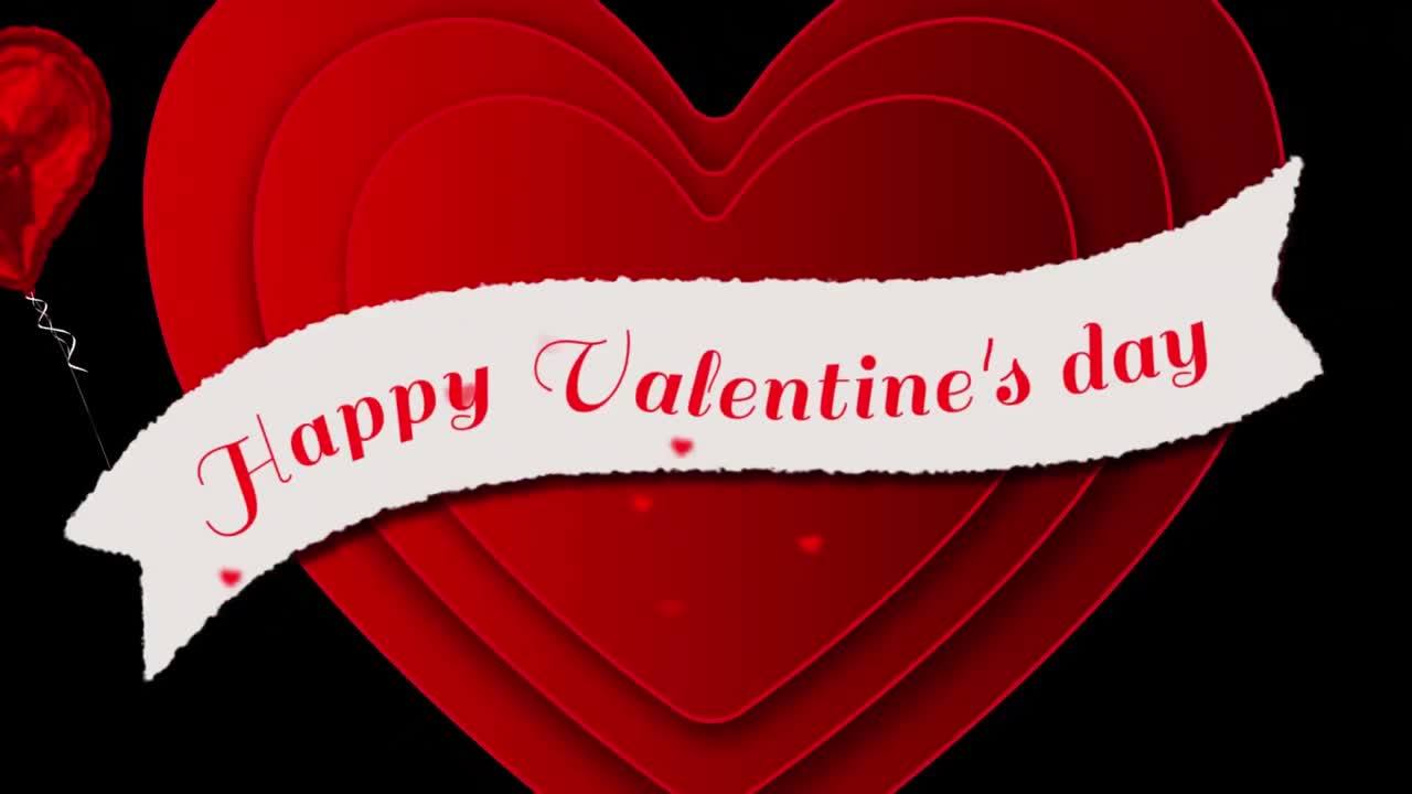 Testo "Buon San Valentino" con cuori che compaiono su sfondo nero