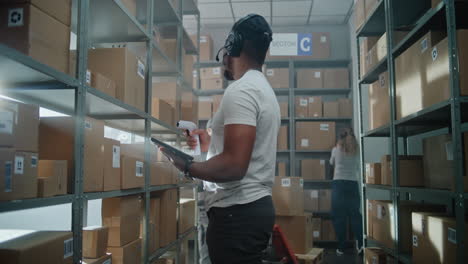 warehouse workers scanning and checking inventory