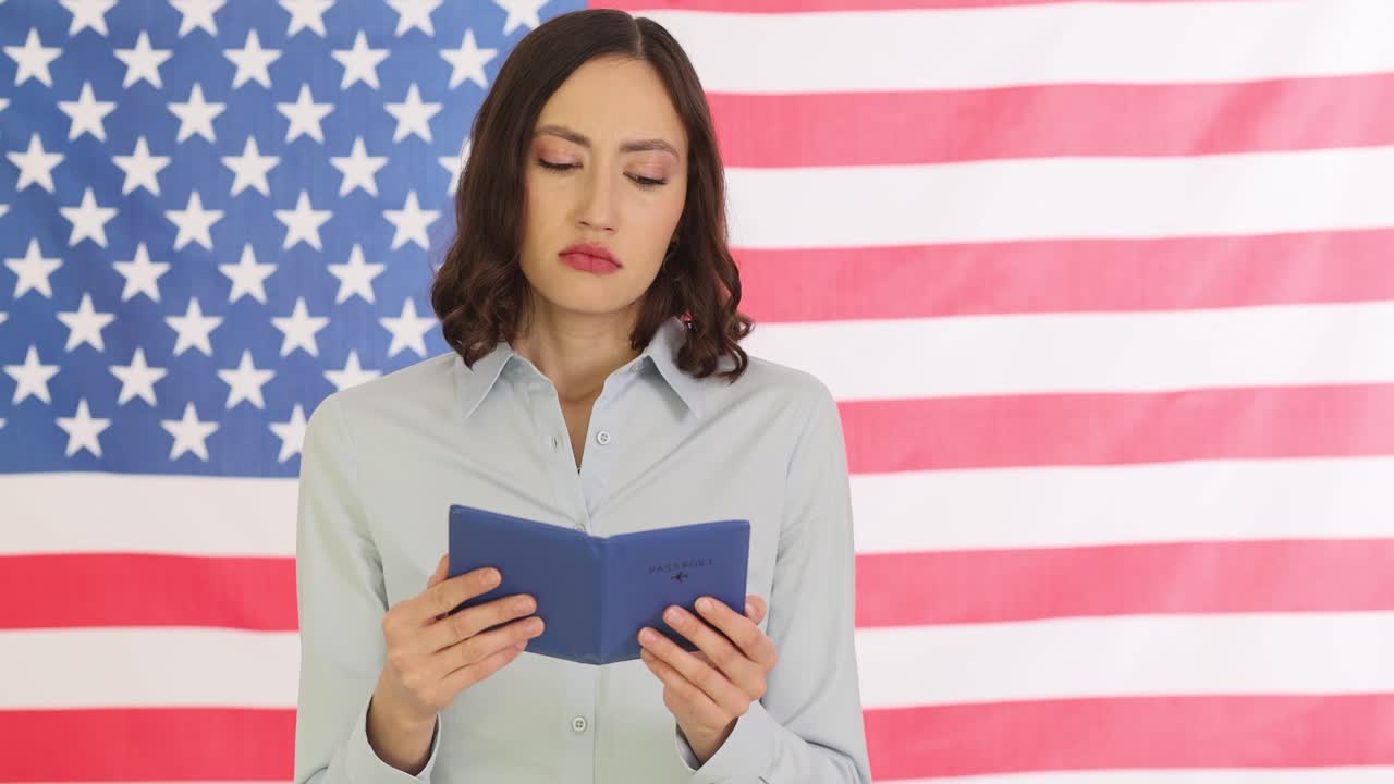 Woman with passport in front of American flag