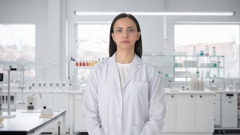 serious indian female scientist looking