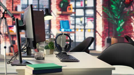 digital workstation features multiple pc monitors running artificial intelligence