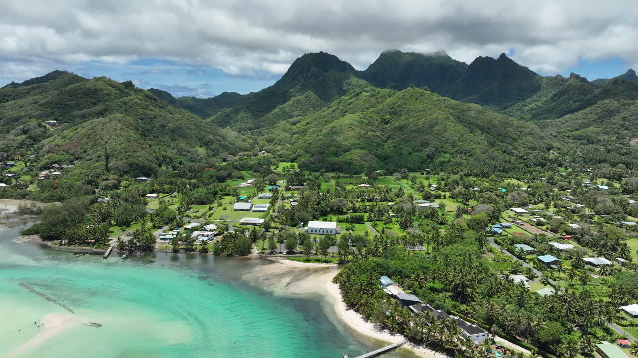 Aerial pan from Muri Lagoons to Avana Passage harbor in Rarotonga Cook Islands by Garden of Seven Stones