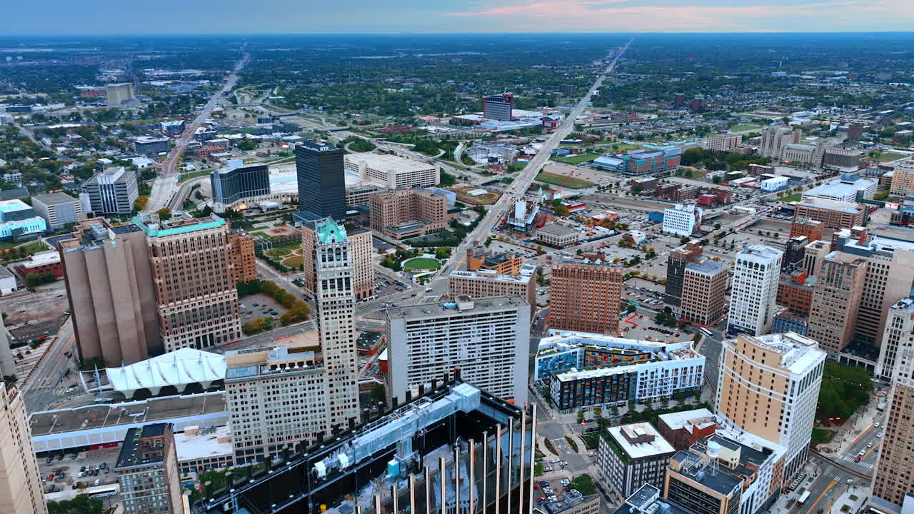 Detroit, USA, 28 July 2025: At the top of the high-rise glass building reflecting the scenery of Detroit, Michigan, USA. Revealing view on the long straight roads crossing the cityscape
