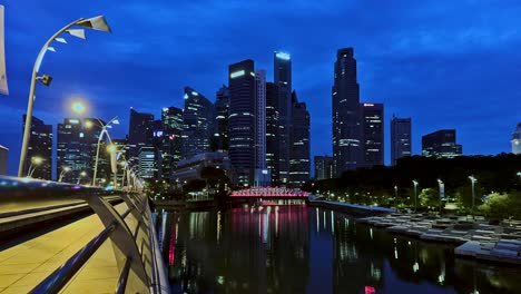 time lapse of singapore skyline at dawn with the anderson bridge middle center