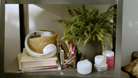 girl's stuff on a shelf