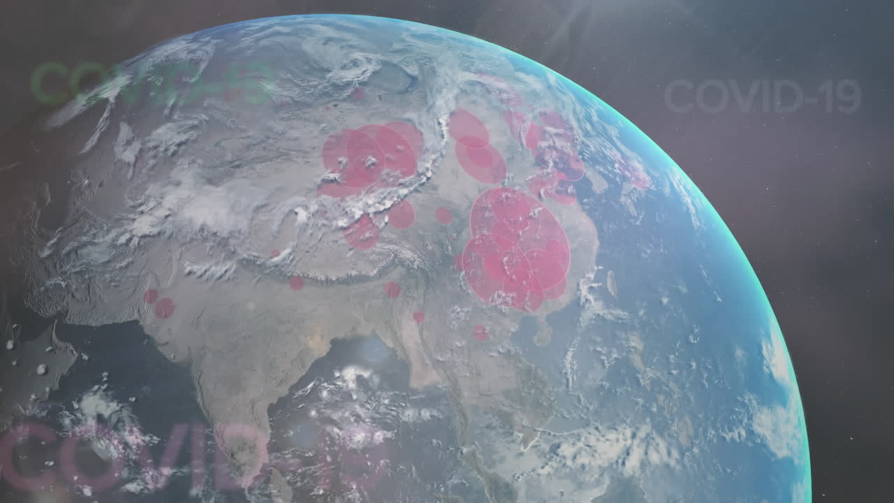 animación de las palabras covid-19 flotando sobre el globo girando