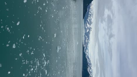 hubbard glacier, alaska and ice floating in disenchantment bay - vertical orientation