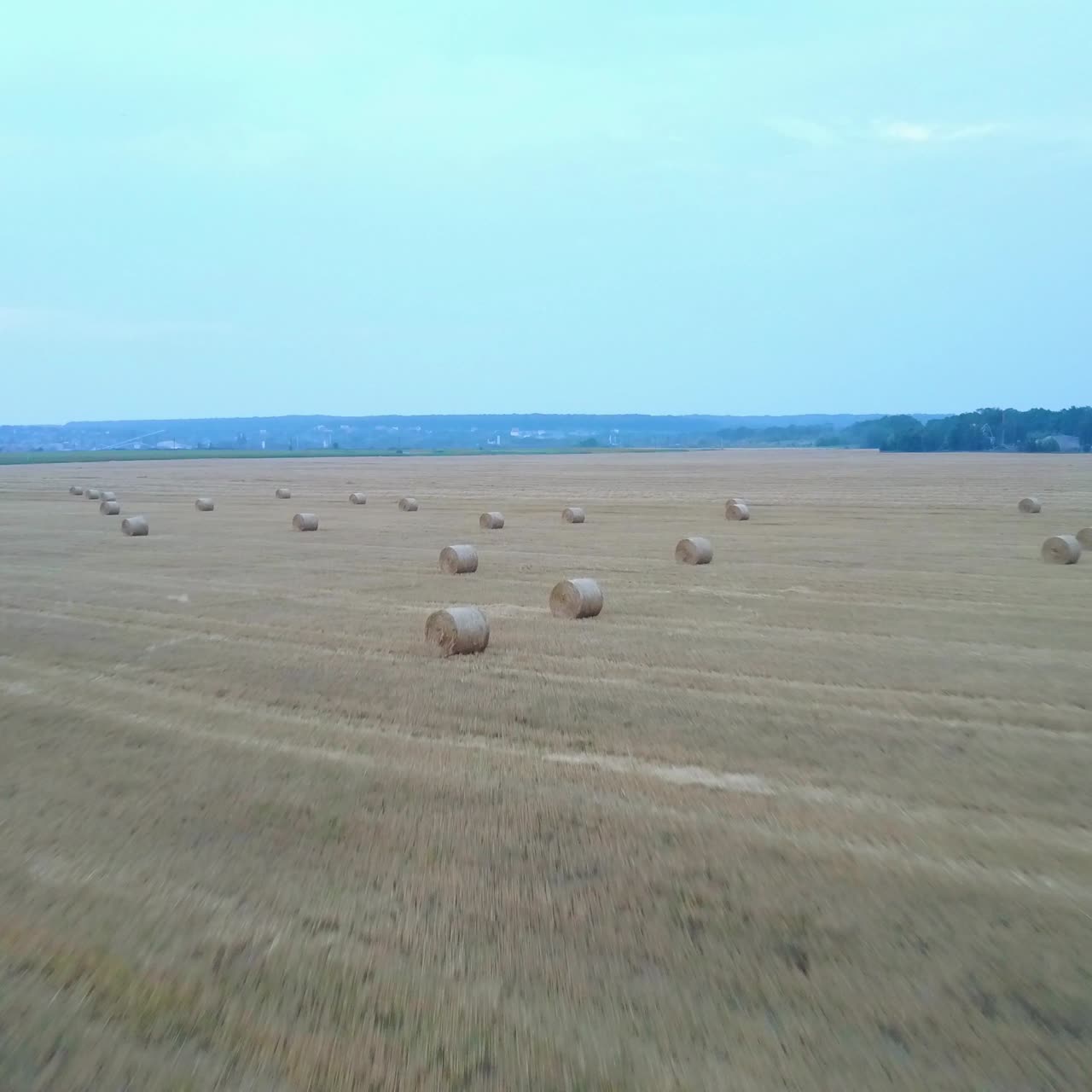 Golden Wheat Field With Hay Bales