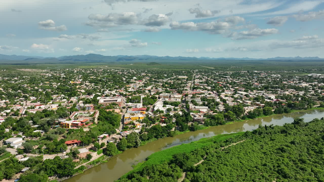 Panoramic drone shot circling the El Fuerte Magic Town, in sunny Sinaloa, Mexico