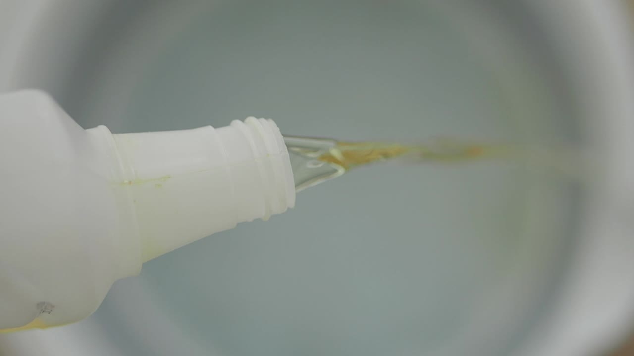 Pouring disinfectant liquid