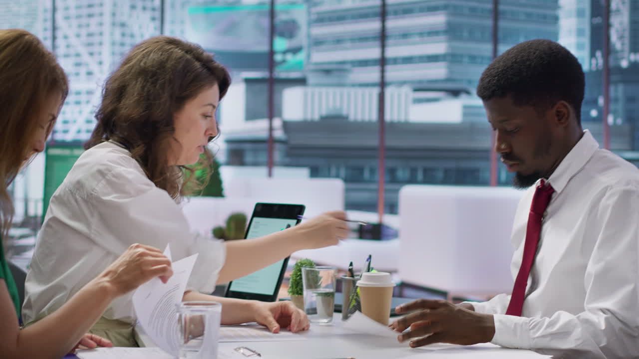 Male job candidate filling in his application form in high end office