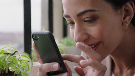 woman using smartphone taking photo of caterpillar crawling eating plant enjoying watching beautiful insect worm sharing on social media in apartment home close up