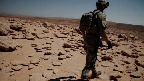 soldier walking in the desert