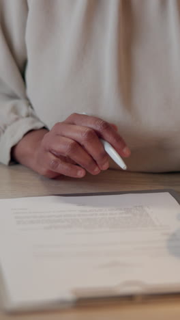 person signing a document