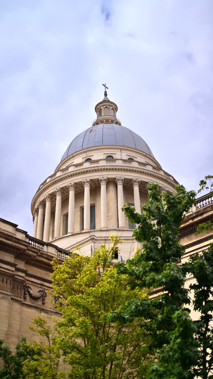 The top of the Pantheon in the Latin Quarter with the blue sky on the background. Vertical, Paris, France