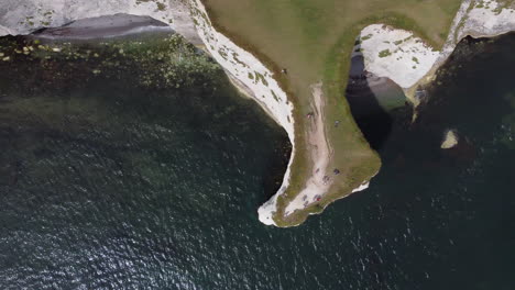 panning top down vertical aerial view of old harry rocks coastline
