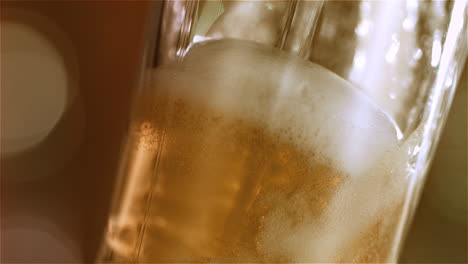 beer is pouring into angled glass-2