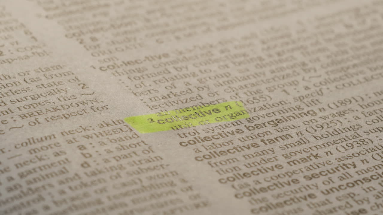 Collective Political Dictionary Highlighter Concept, highlighting a word in a dictionary to show it's definition