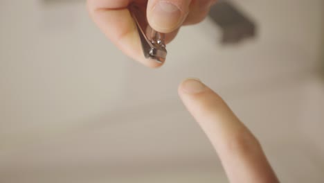 Close-Up-Of-Cutting-Nails