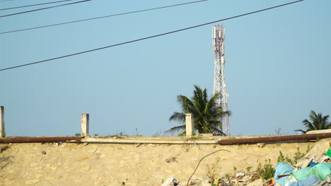 Torre-De-Telecomunicaciones-Y-Paisaje-Lleno-De-Basura-En-Vientnam