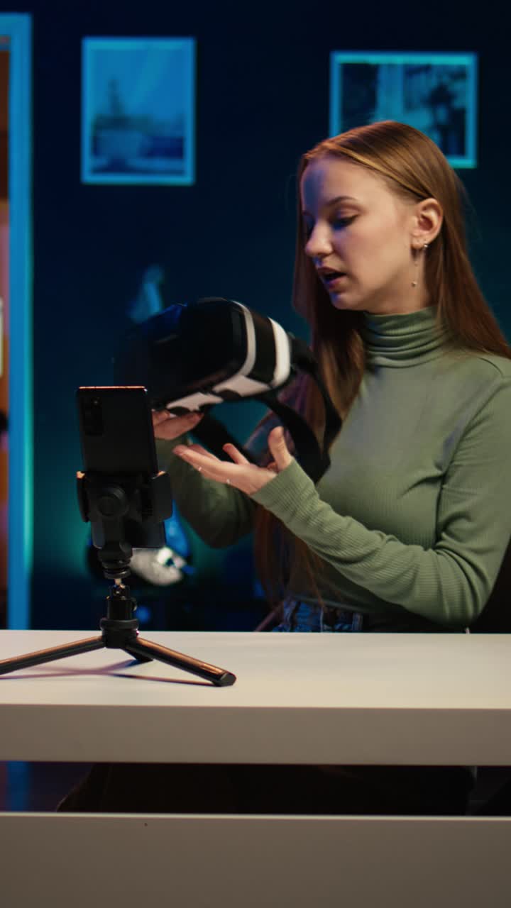 Young Woman Vlogging About Virtual Reality Headset on Smartphone