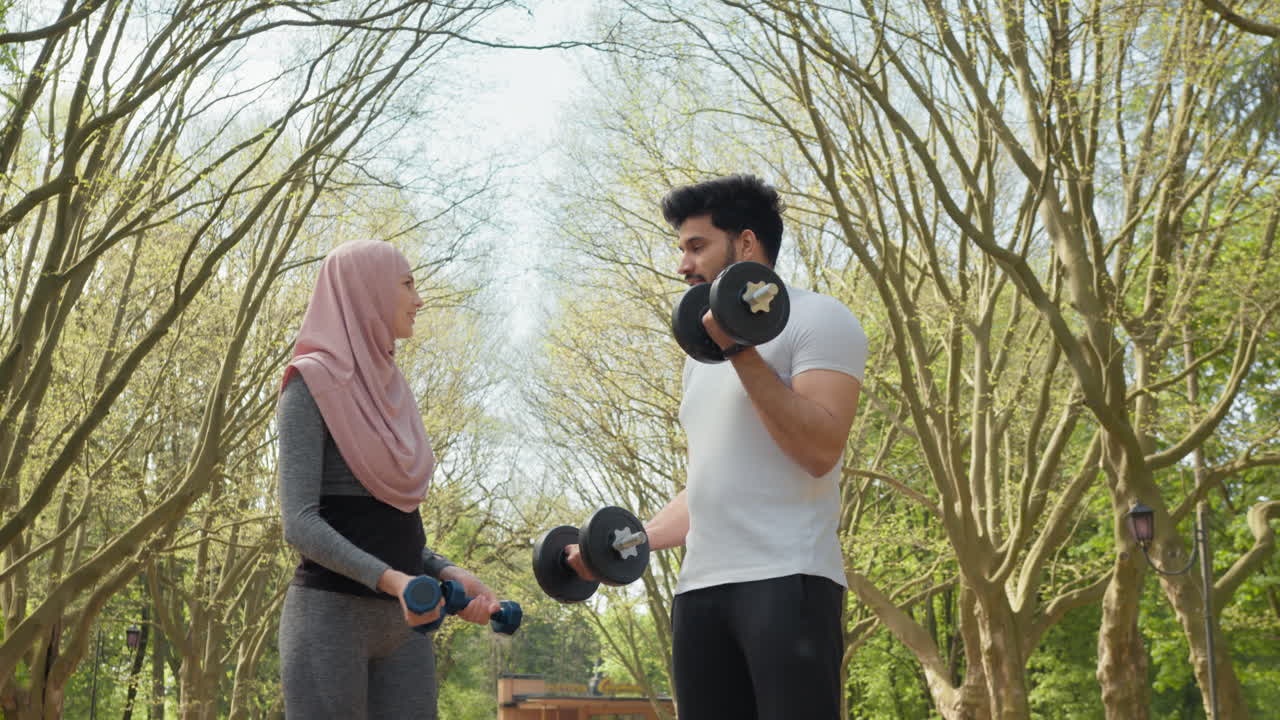 Couple Working Out in a Park
