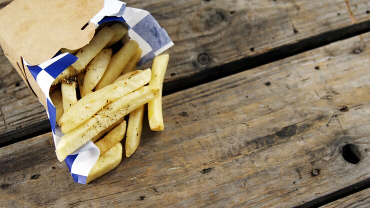 French fried chips in a take away container