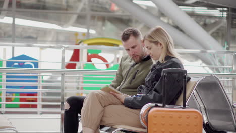 couple waiting at airport