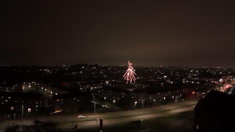 dark city neighbourhoods, highway traffic, firework night, aerial view