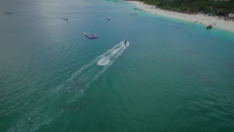 jetskiing on the coast of the indian ocean in nungwi, zanzibar