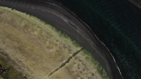 aerial - beautiful coastline in hvitserkur,vatnsnes, iceland, top down circling