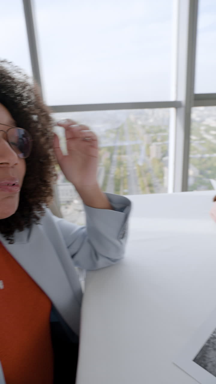 Woman in video call from a restaurant