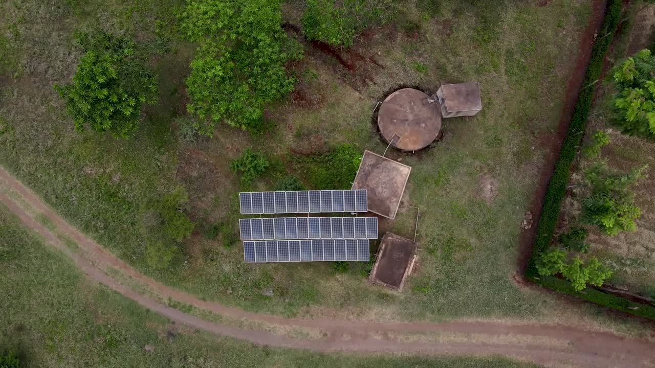 solar panel in farm--Green bio organic low waste smart agriculture - Solar panels pumping water farm kenya Africa covid 2020-2021 social distancing 2020 new year 2021.climate change Paris agreement
