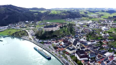 beautiful drone shot of the village "grein" in austria