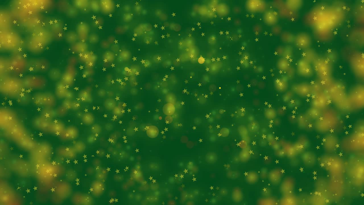 Abstract motion green background shining yellow particles and stars. Shimmering glittering particles with Bokeh.