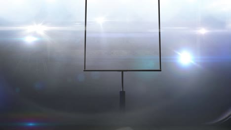 animation of american football goalposts and cloudy sky at floodlit stadium