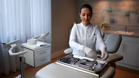medical professional preparing instruments in clinic