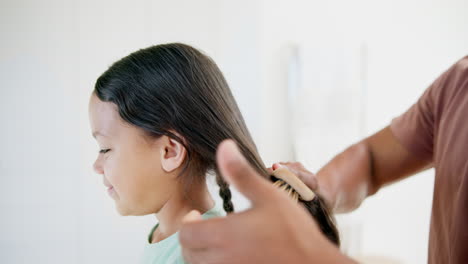 child, hair care and brush for grooming in home