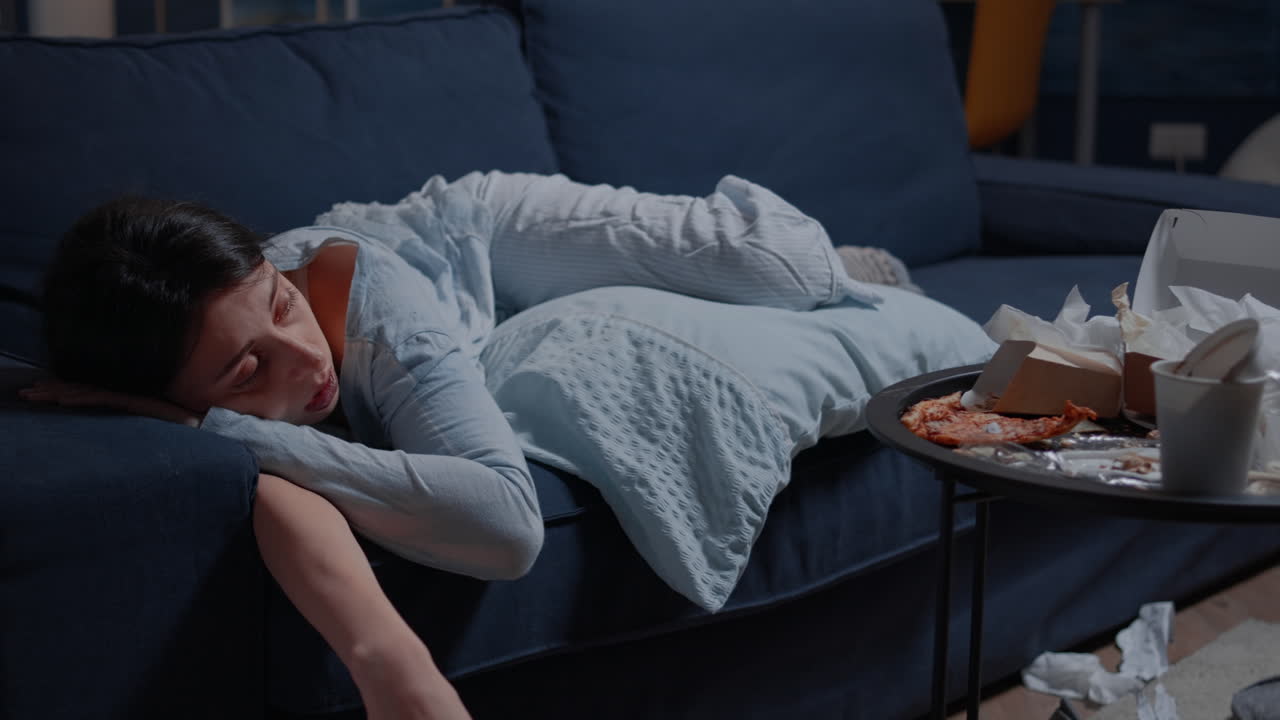 Sad depressed young woman crying mourning thinking of loneliness