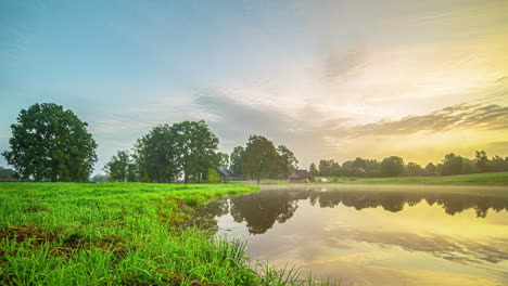 woods cabin by the lake nature landscape early morning to sunset time lapse