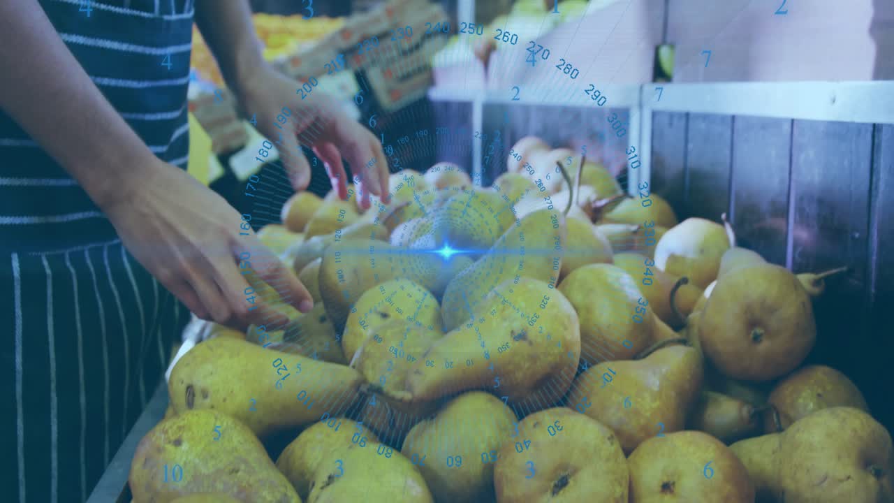 Woman reaching into grocery bin, sifting pears, testing ripeness, rotating blue gauge over pile