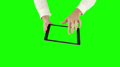 Overview-of-a-businessman-using-a-tablet